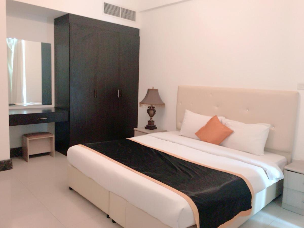Stout Apartments Manama Rom bilde
